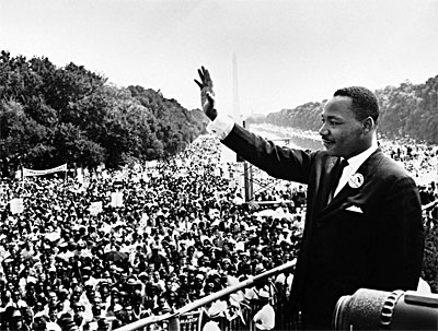 King waving to crowd